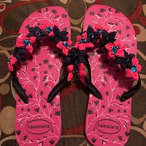 Summer Flip flops w/ multi colored and designs.